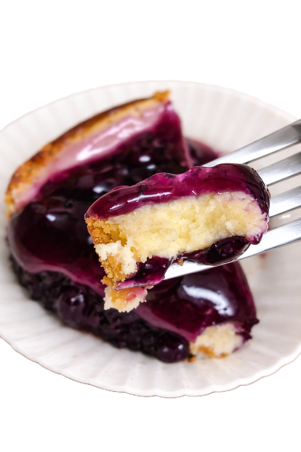 Slice of premium berry cheesecake showcasing rich texture and quality